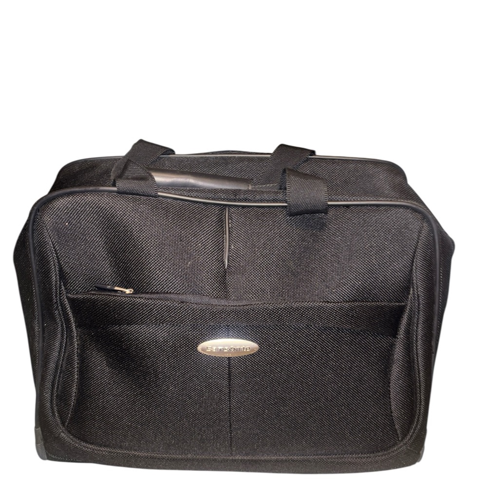 An used Samsonite Black Carry-On Travel Bag with Wheels & Telescopic Handle